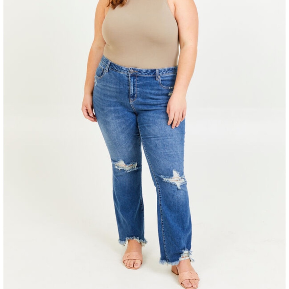 Cory incrediflex bootcut raw hem medium wash jeans
